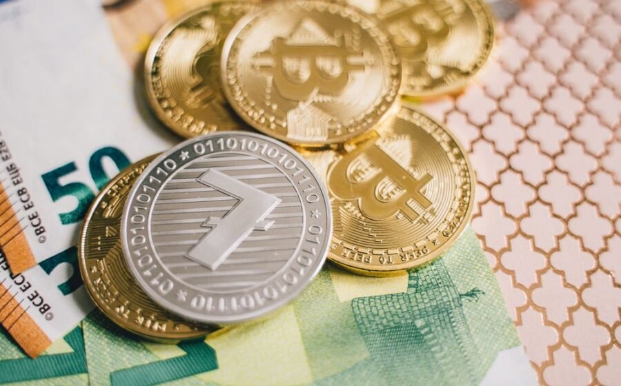 stablecoin kyc debate - Close-up of digital cryptocurrency coins and Euro banknotes, representing modern finance.