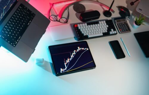 marvell stock slides - A laptop computer sitting on top of a white desk