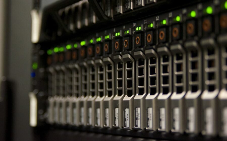 ai data center demand - Server rack with blinking green lights