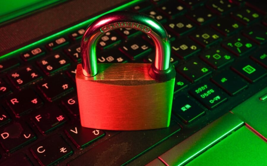 astra model development - red padlock on black computer keyboard