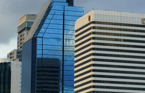 visa stablecoin settlement - Contemporary skyscrapers in Bangkok's urban skyline, showcasing modern architecture.