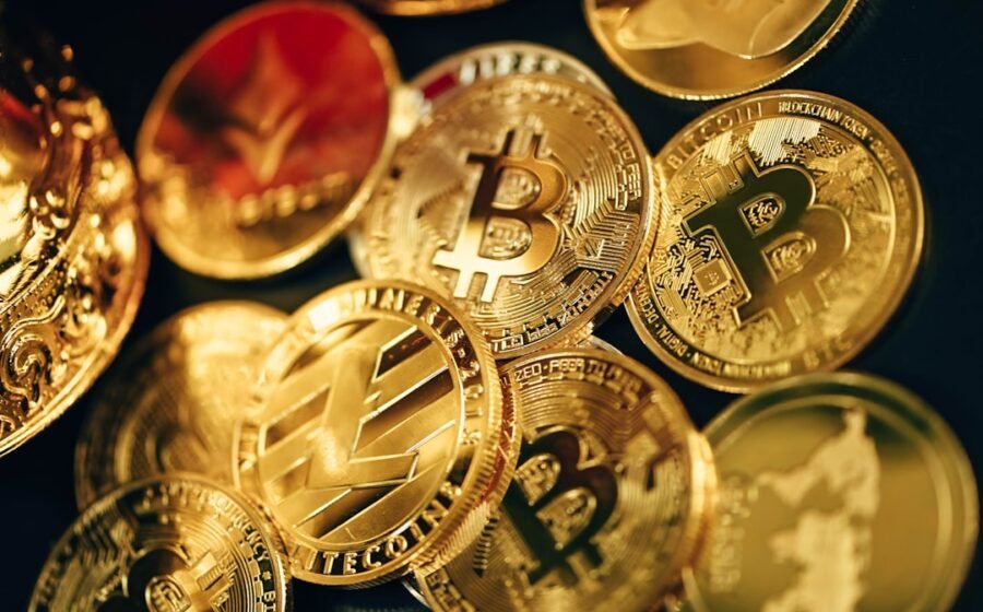 sec tokenized stocks - a pile of gold bitcoins sitting on top of each other