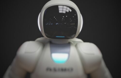 perplexity ai ban - white robot wallpaper