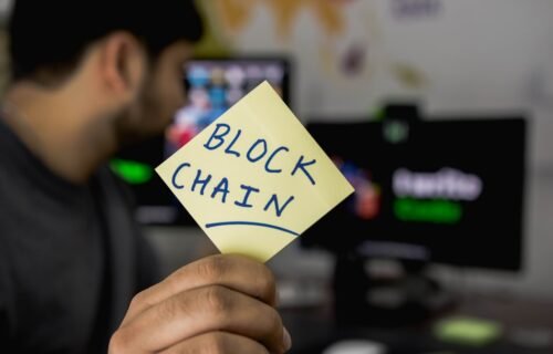 ripple payments remittances - person holding sticky note