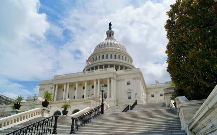 crypto bill senate - white concrete building under blue sky during daytime