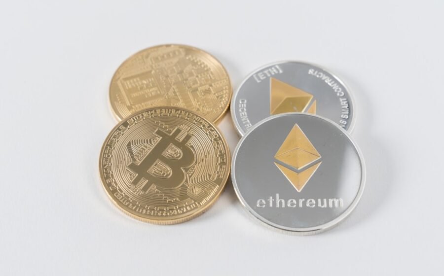 stablecoins cross-border sales - four round silver-colored and gold-colored Bitcoins