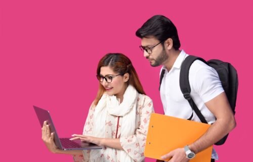 term sheet startup funding - a man and a woman looking at a laptop