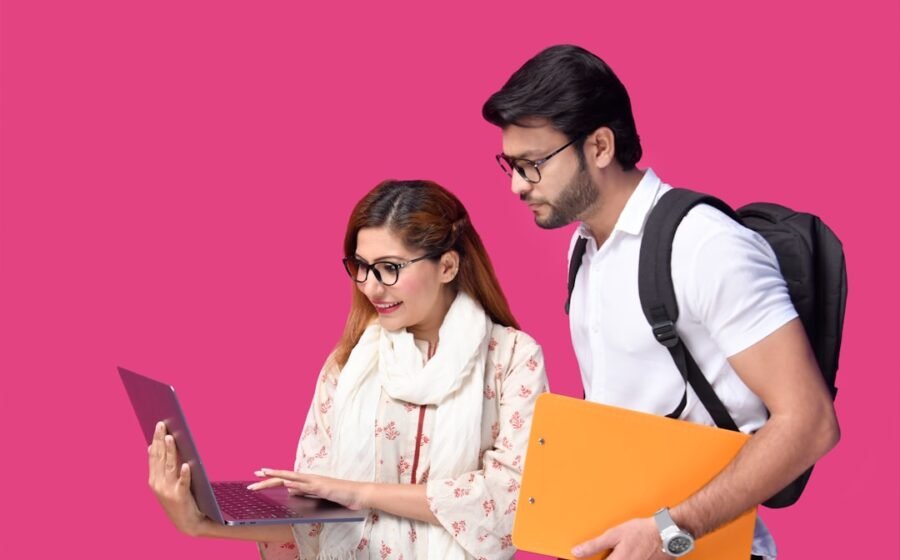 term sheet startup funding - a man and a woman looking at a laptop