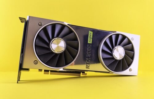 nvidia hugging face - A close up of a video card on a yellow background