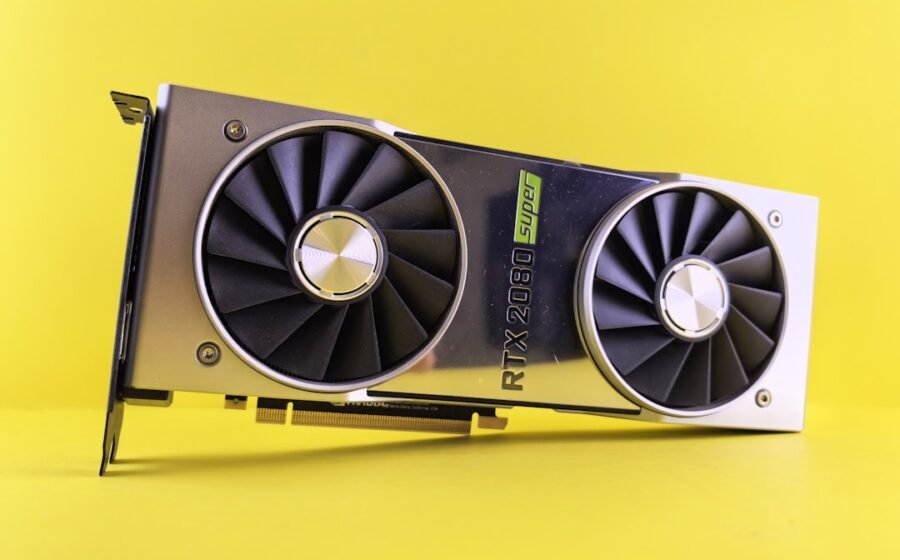 nvidia hugging face - A close up of a video card on a yellow background