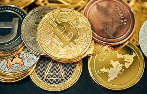 crypto bank approval - a pile of gold and silver bitcoins